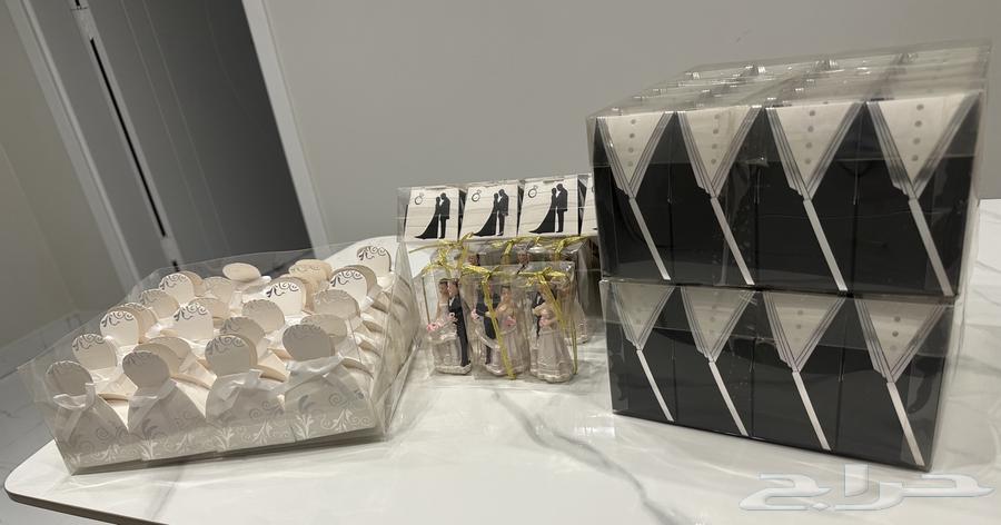 توزيعات زواج توزيعات ملكة توزيعات عرسان بأسعار جمله64396922169857111