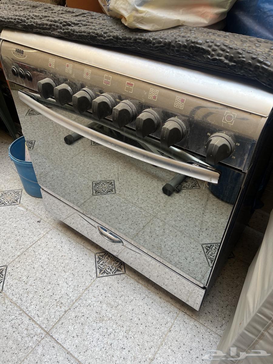 Five-burner stove with two ovens for 400 total63619565574915113