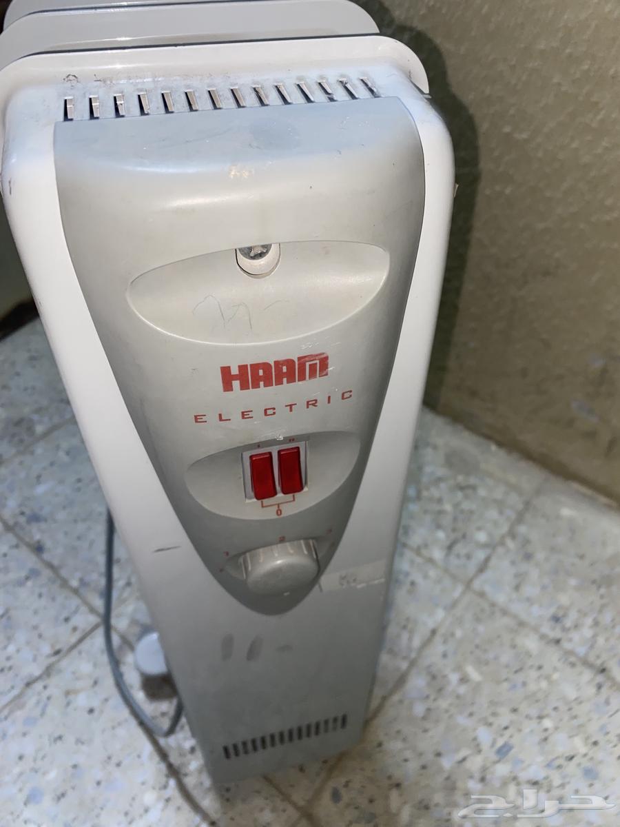 Excellent small heater with 10 candles and large one with 13 candles64402803877633111