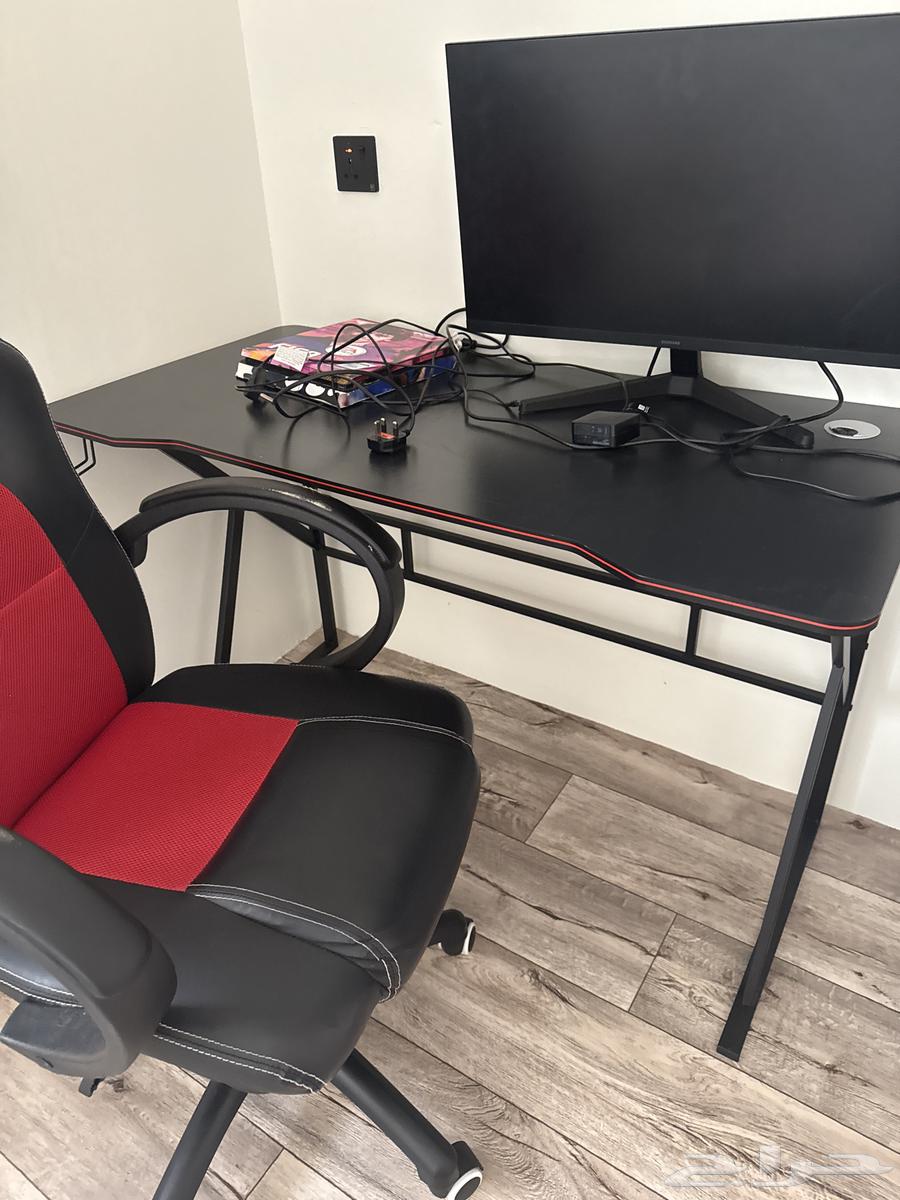 Sony PS5 console, mouse, keyboard, table, screen, controller, and chair63619566934657113