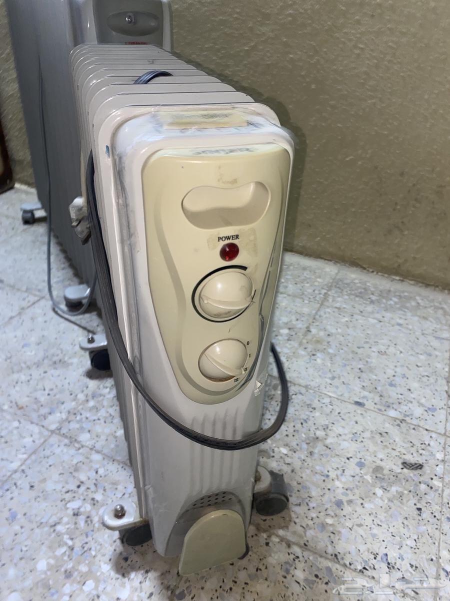 Excellent small heater with 10 candles and large one with 13 candles64402803877633112