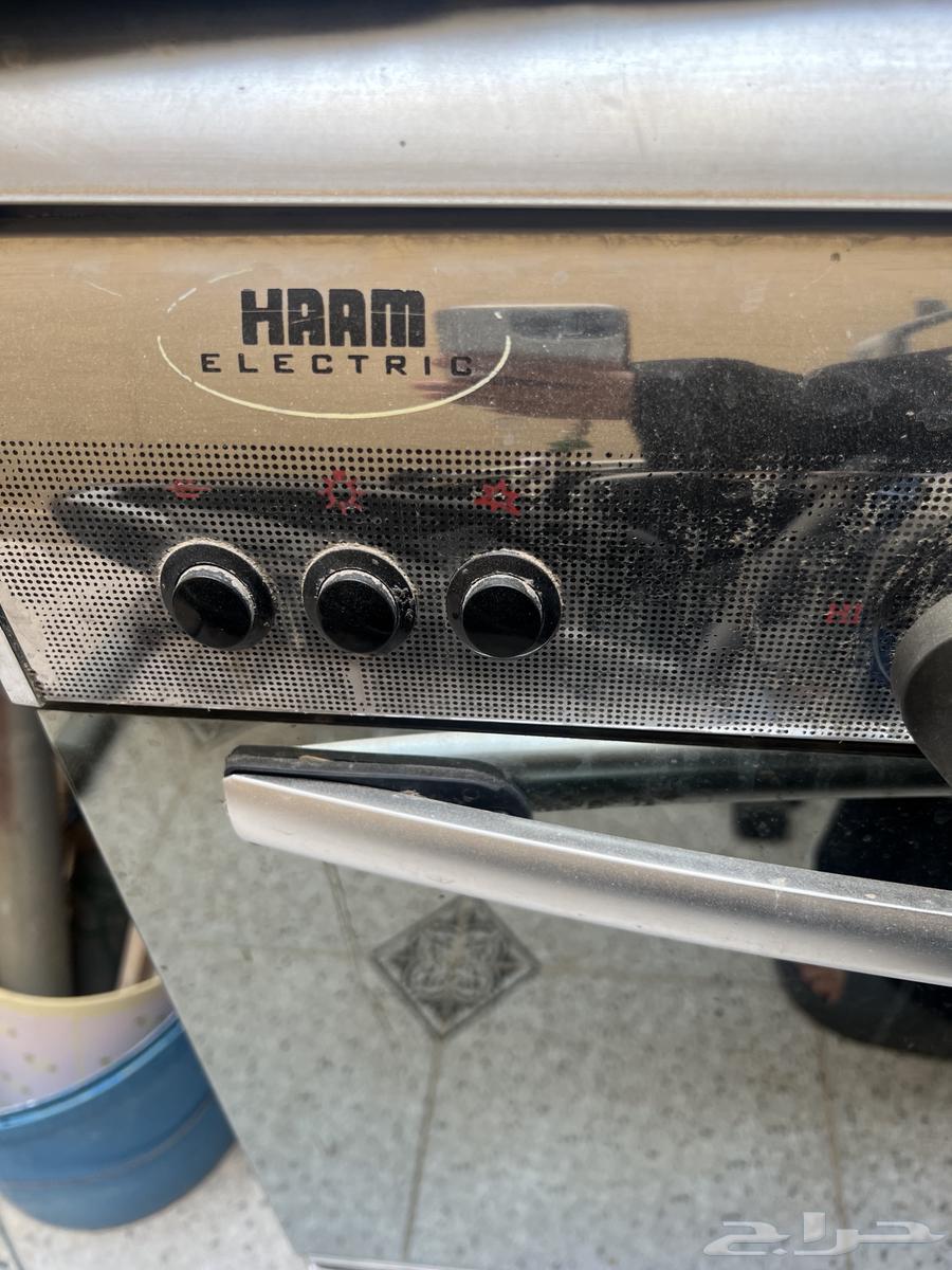 Five-burner stove with two ovens for 400 total63619565574915112