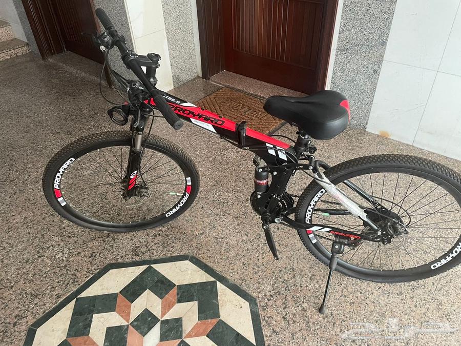 Proyard bicycle red with black, in good condition, size 26, foldable64403743929729113