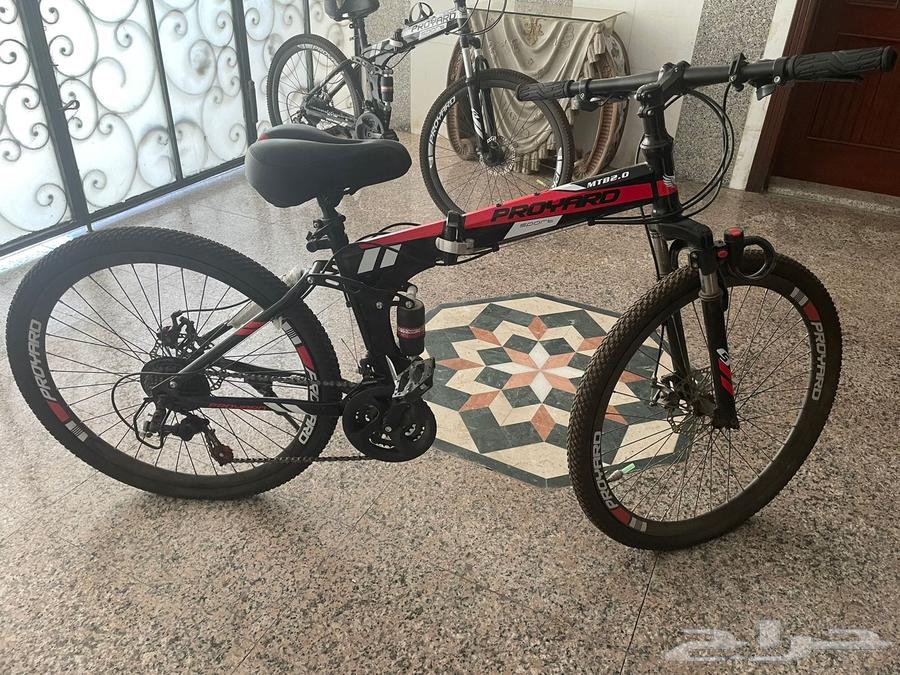 Proyard bicycle red with black, in good condition, size 26, foldable64403743929729110