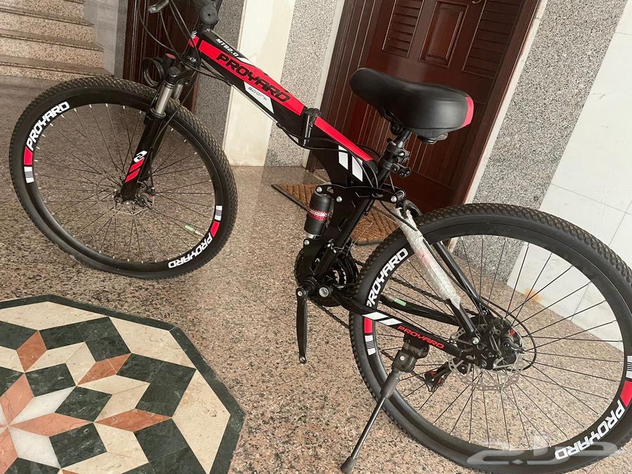 Proyard bicycle red with black, in good condition, size 26, foldable64403743929729112