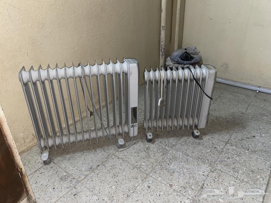 Excellent small heater with 10 candles and large one with 13 candles64402803877633110