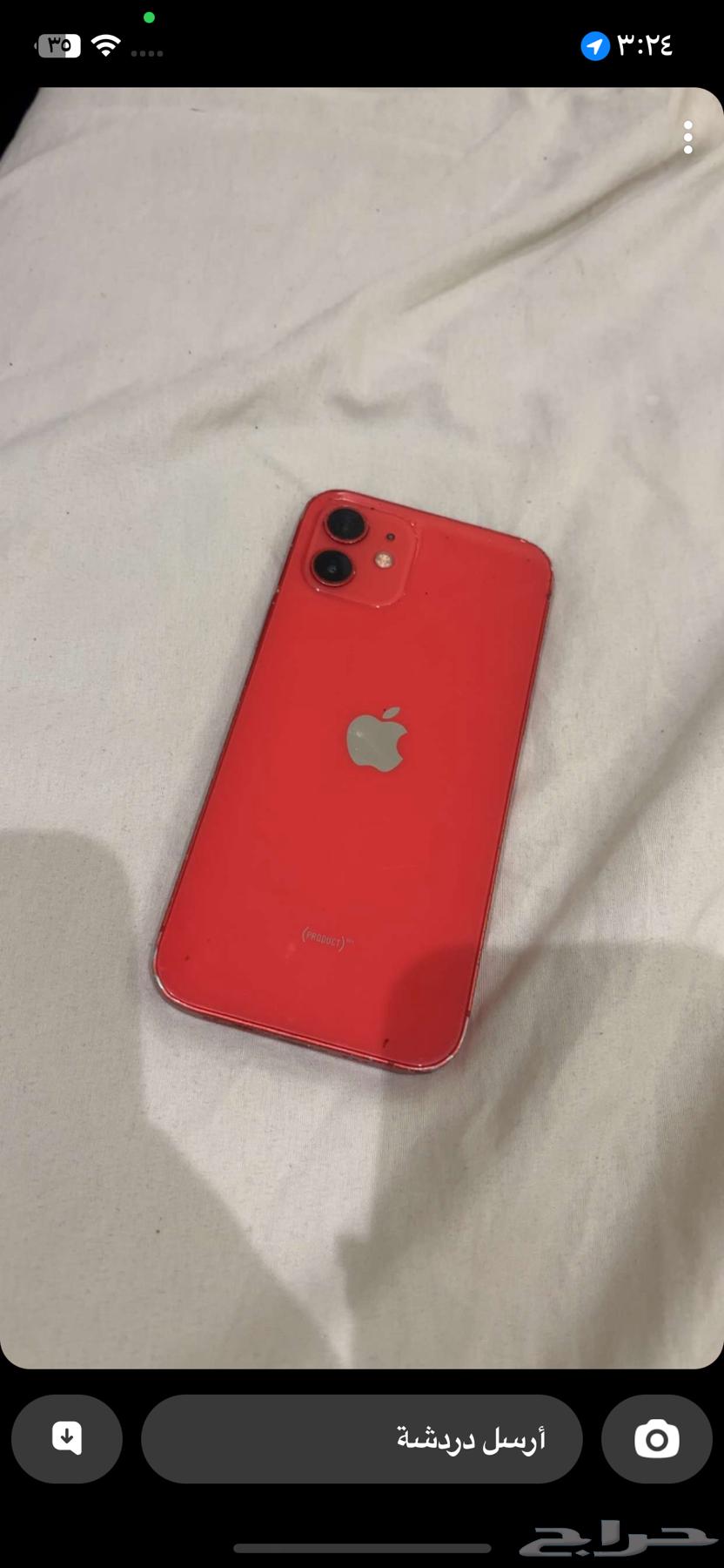 ايفون احمر1264404222440577111