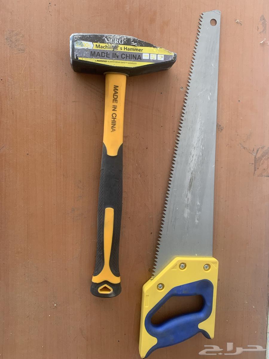 منشار خشب ومطرقة64409449901059110