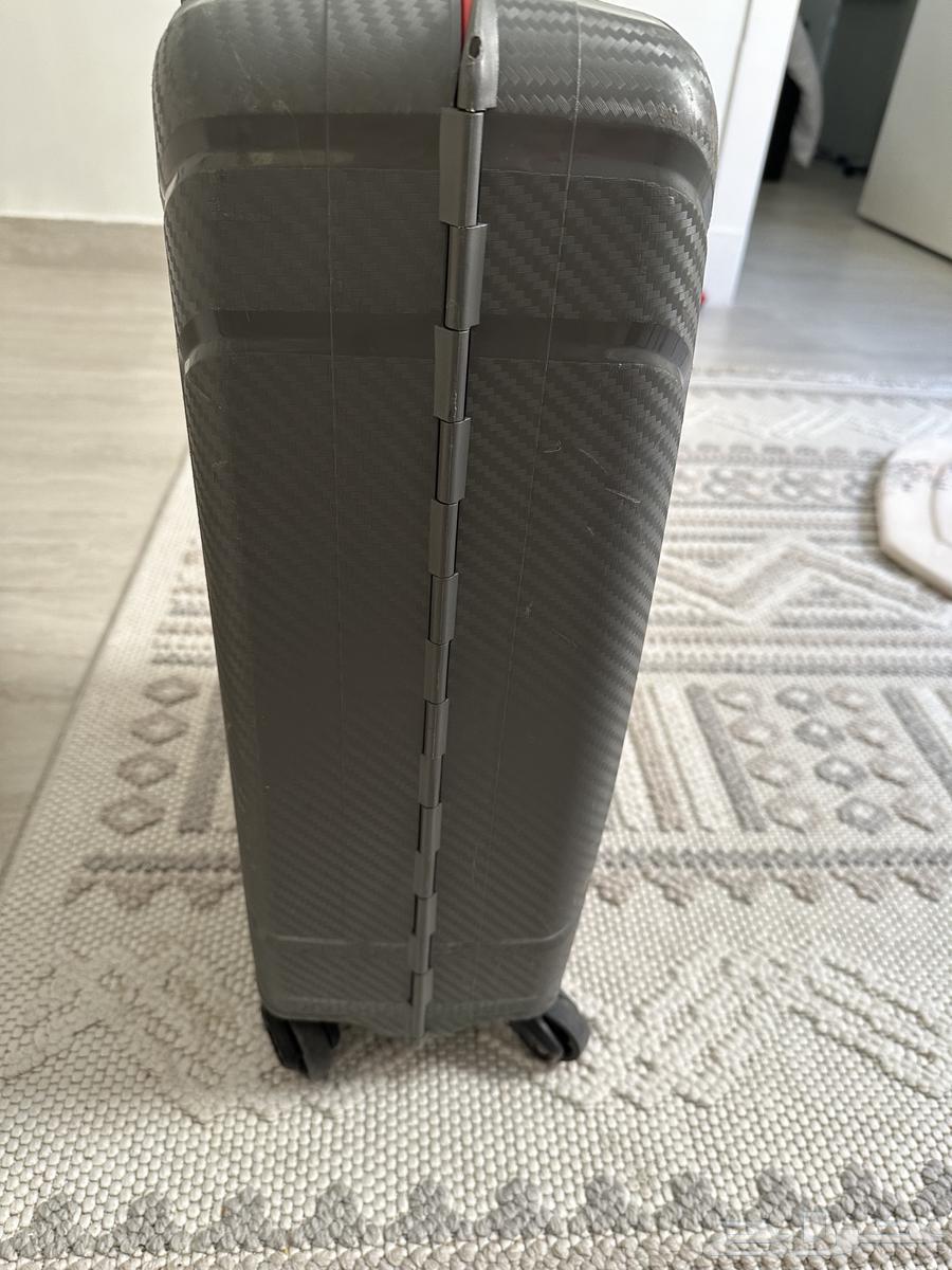 شنطة سفر64406904649217112