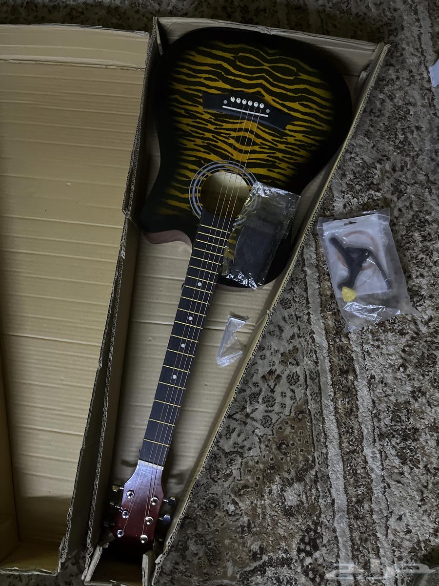 قيتار جديد مع كامل اغراضه64409464193923110