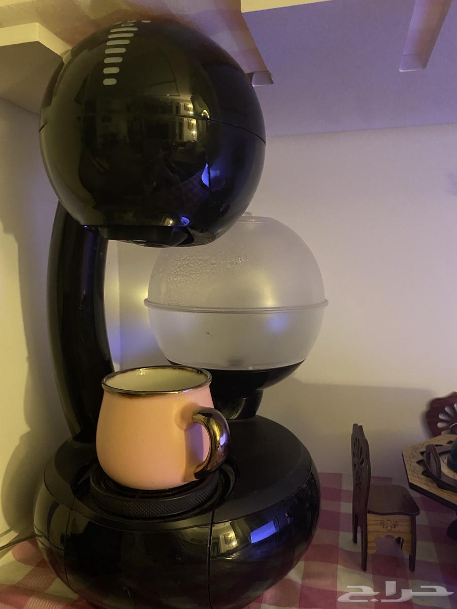 ماكينة قهوة مع طاولة قهوة64408259191811110