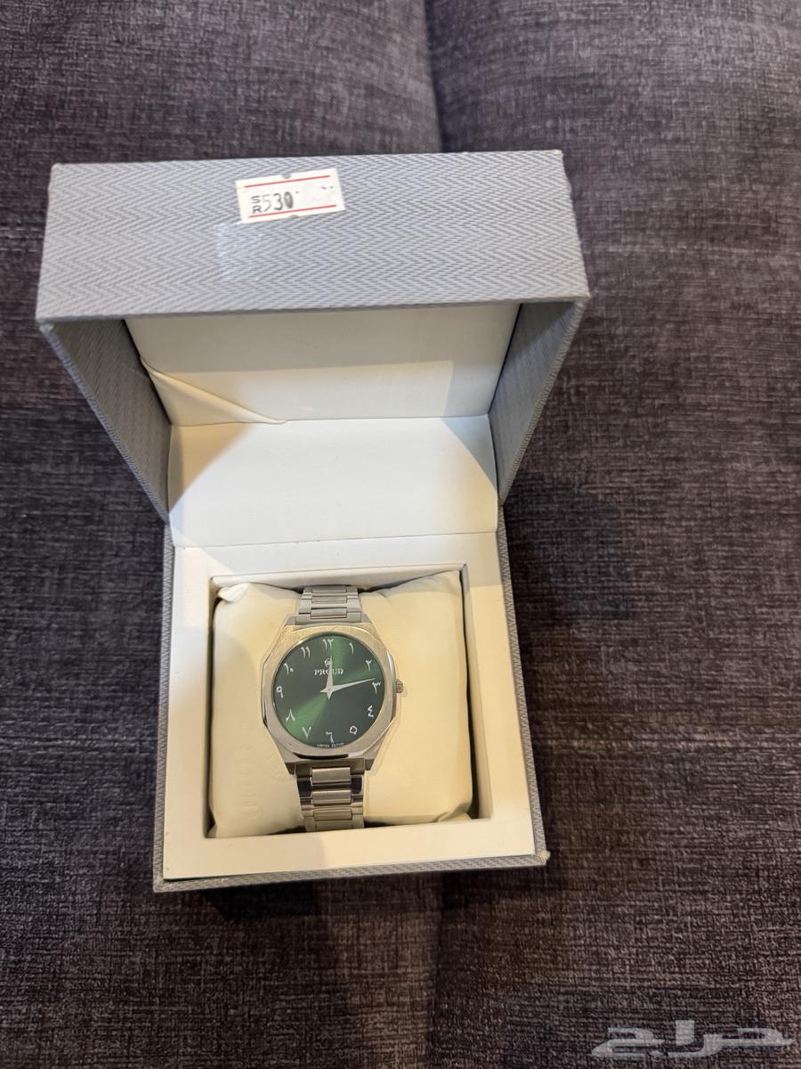 ساعه فضيه من داخل اخضر64405028421505114