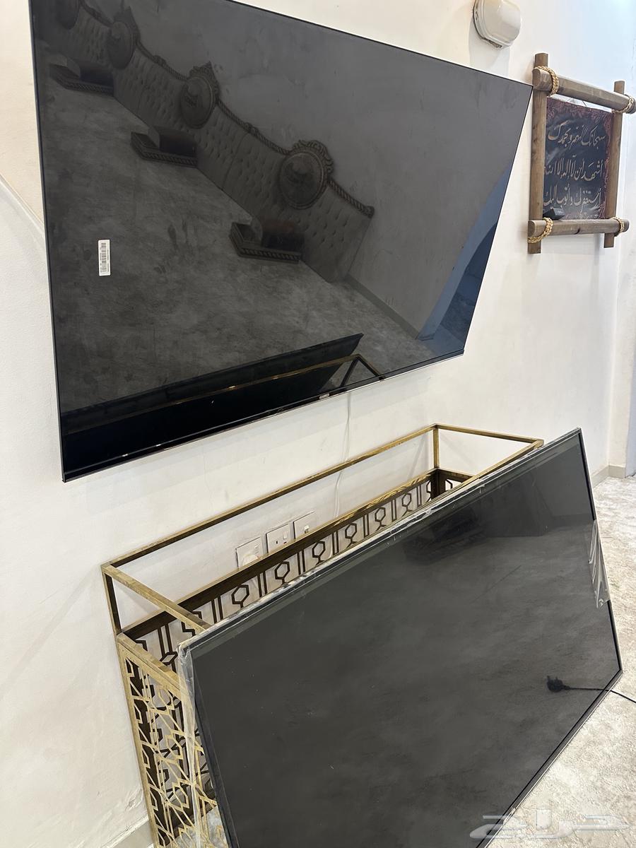 2 KMC TVs 65 inches with broken screens due to a minor resolution issue that isn't clear64411715053313110