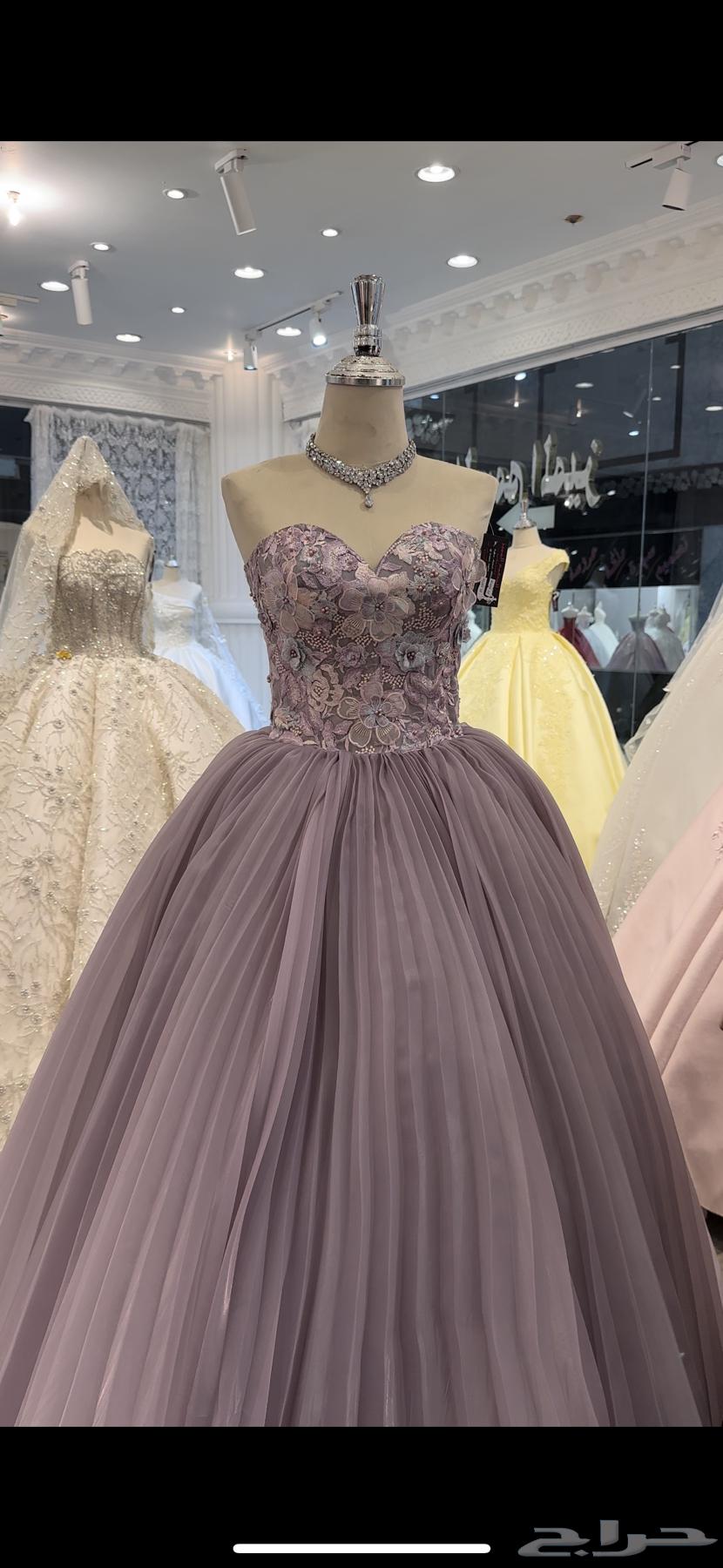 فستان جديد وغير ملوبس مقاس من L او LX السعر 40064406193672450110