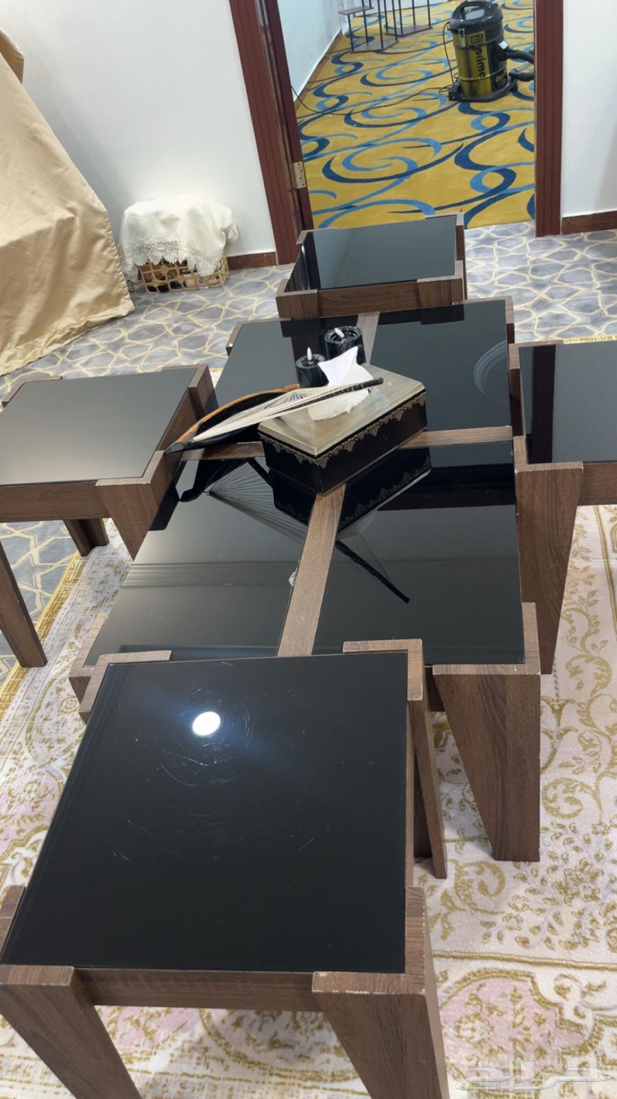 4 small and 1 large majlis tables and a burnt brown TV table with glasses64422232507906112
