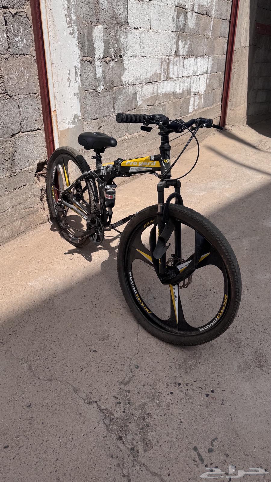 دراجه هوائيه رياضيه قابله للطي اصفر بأسود مقاس 2664415491550979110