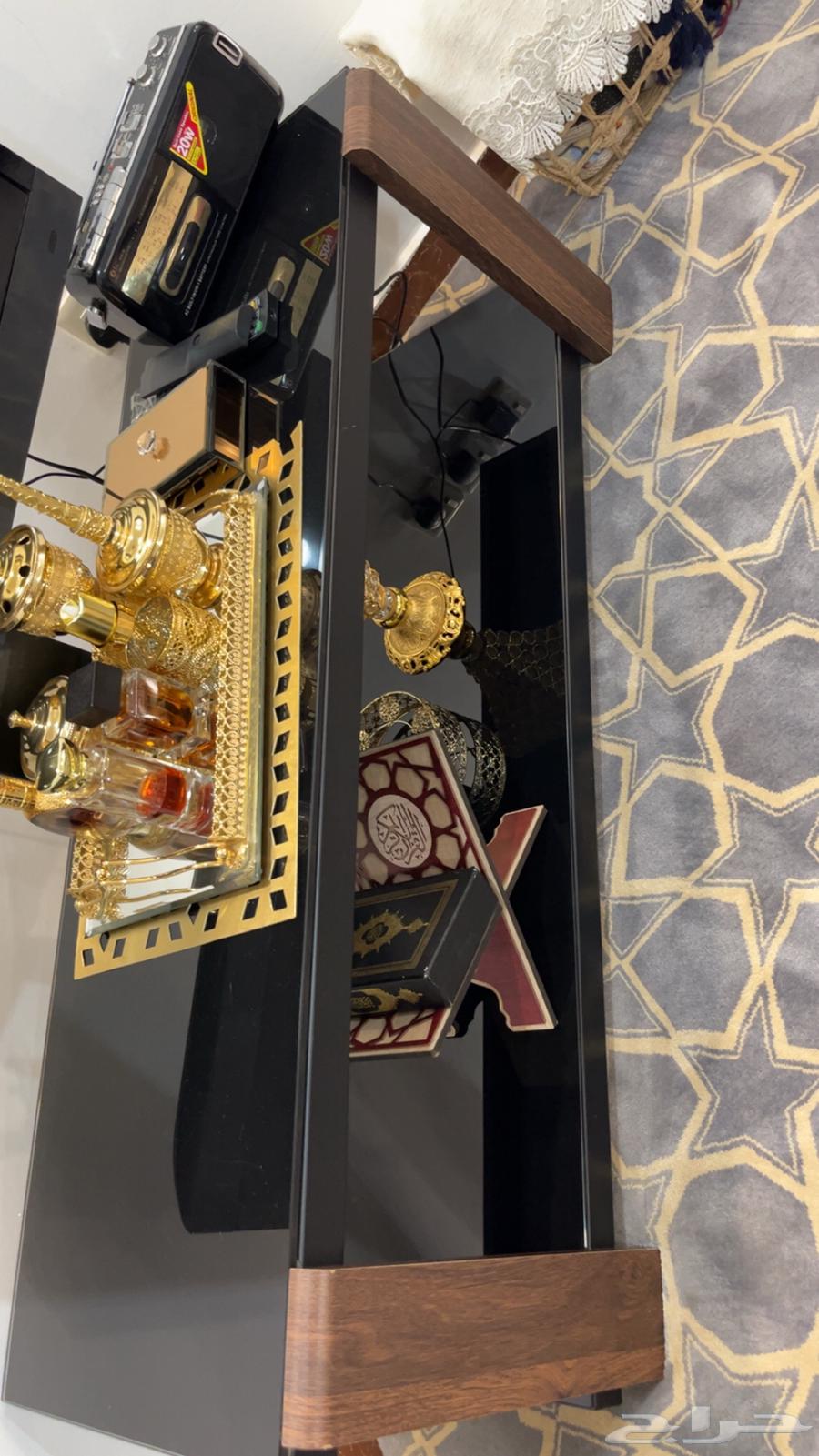 4 small and 1 large majlis tables and a burnt brown TV table with glasses64422232507906111