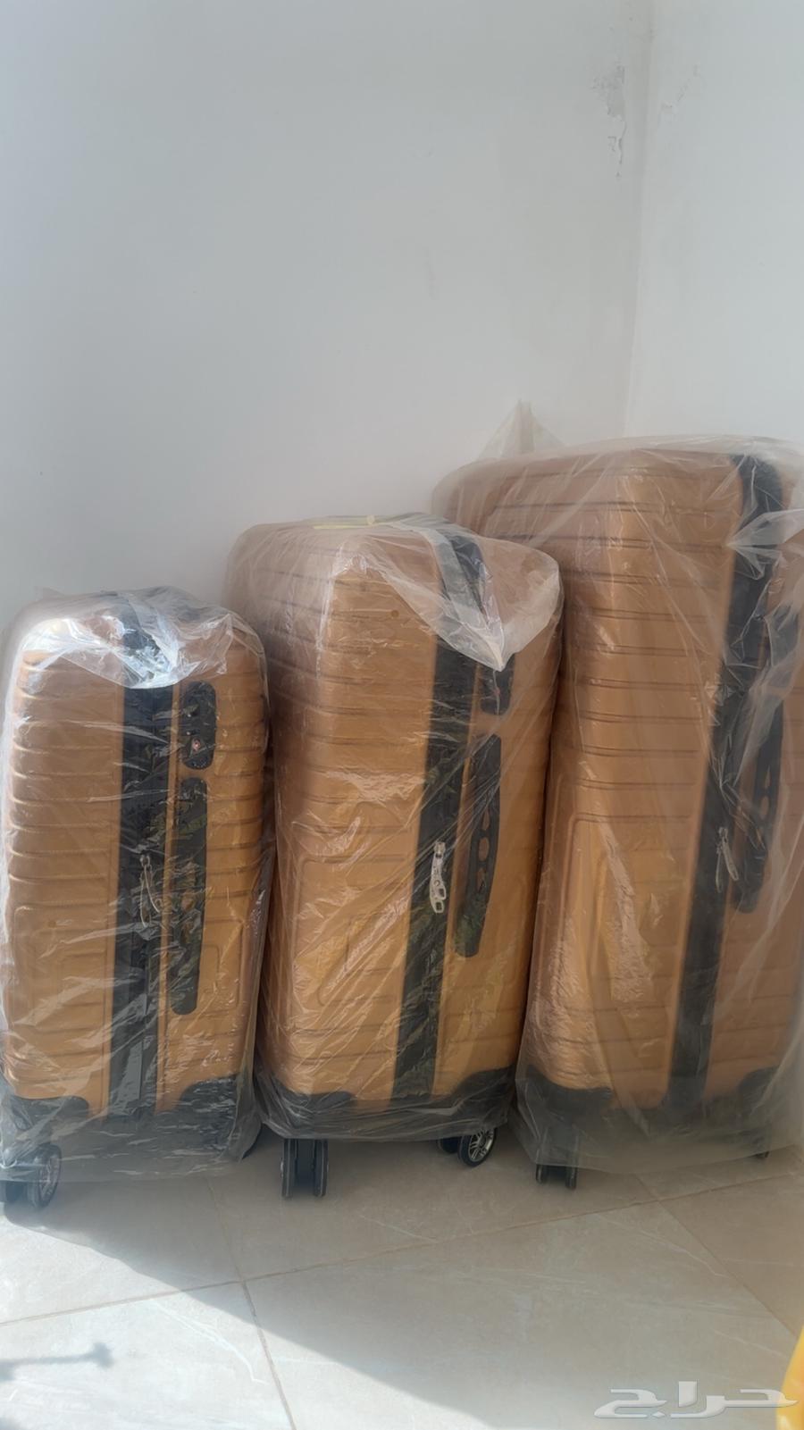 دفاية و شنط اصلية جديدة64415733251331114