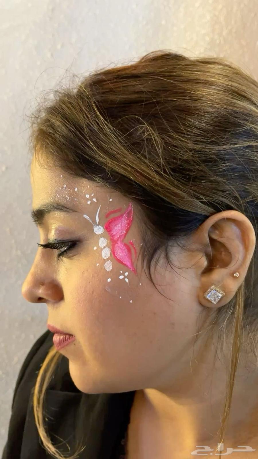 نقش حناء ورسم على الوجه لليوم الوطني64417035235201112