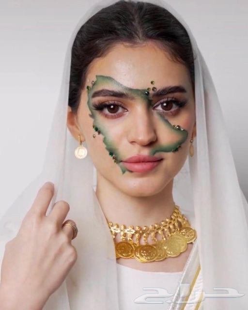 نقش حناء ورسم على الوجه لليوم الوطني64417035235201111