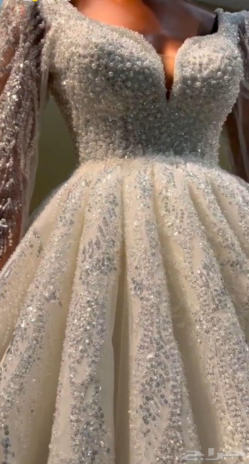فستان زواج نضيف لا يحتوي على اي شق او تلف معاه شرعه ب 50064414355739137113