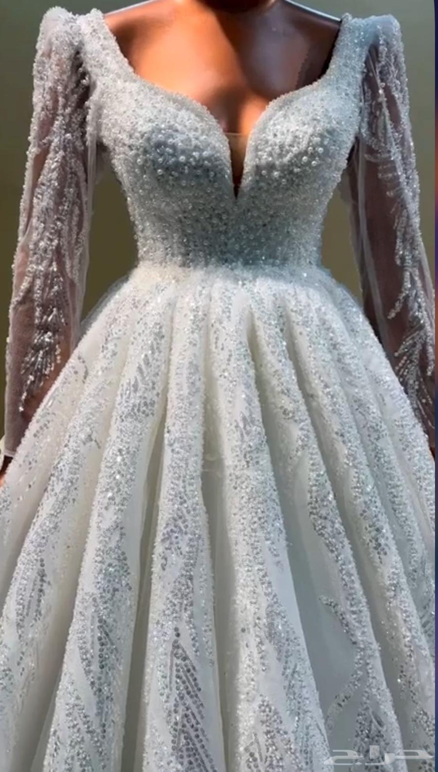 فستان زواج نضيف لا يحتوي على اي شق او تلف معاه شرعه ب 50064414355739137112