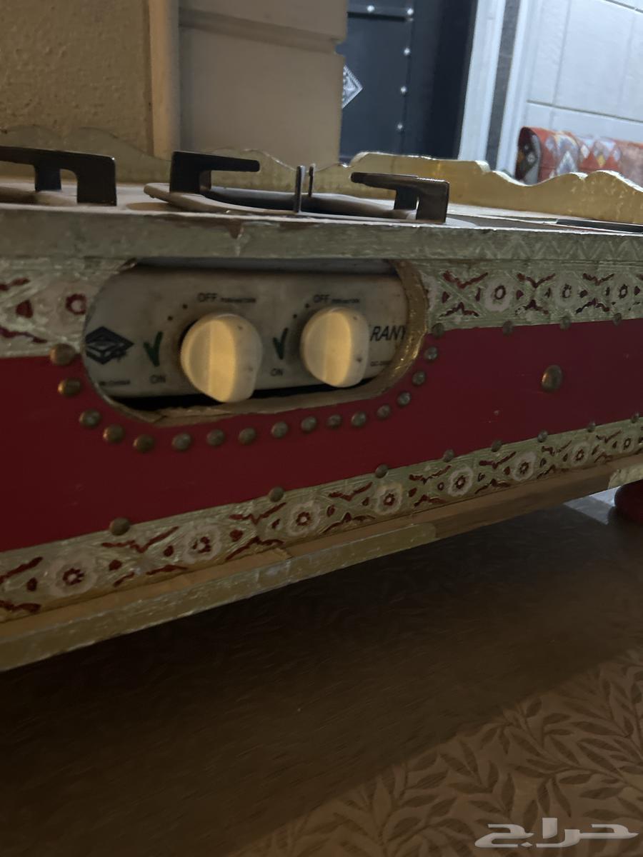 للبيع موقد نار تراثي مزخرف (عينين غاز عين كهرباء)مع طاولة64420216117251112