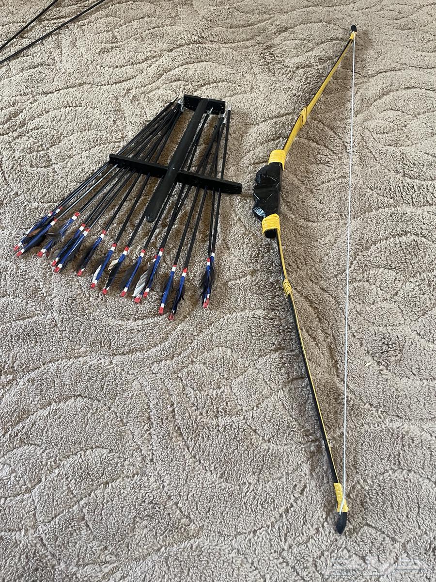 قوس خشبي وأسهم ديكور للزينة64422929022209111