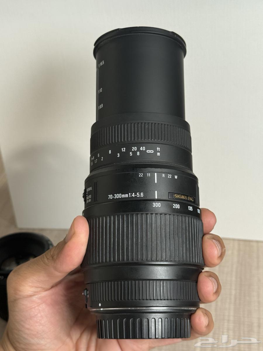 عدسة لكانون ef سيقما 70 _ 300 زوم نظيفة64422367545985114