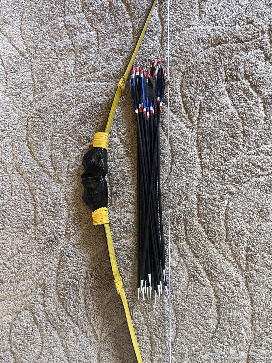 قوس خشبي وأسهم ديكور للزينة64422929022209110