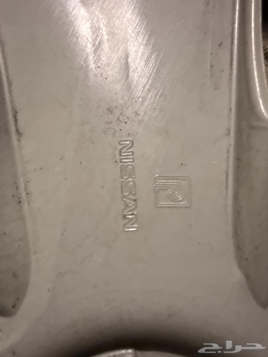 طاسه 1 نيسان صني اصليه الخرج64586874194563112