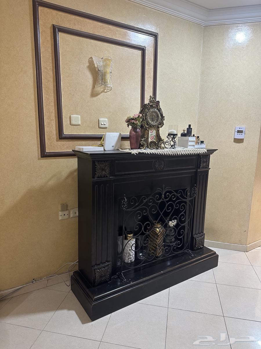 طاولة على شكل مدفأة كبيرة64425327259905110