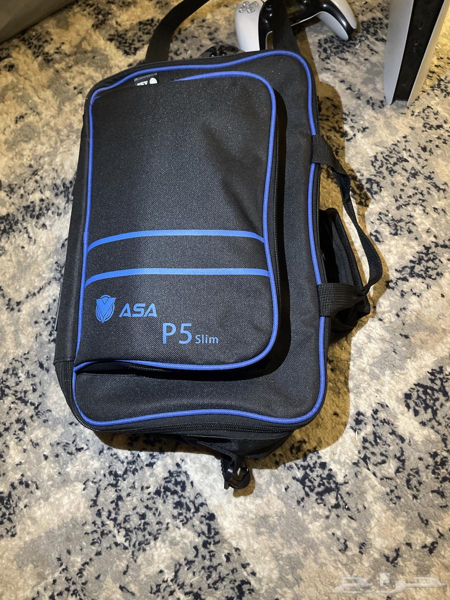 Sony 5 with two controllers and a clean bag64420148732163111