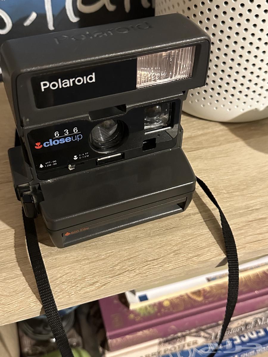 كاميرا فورية قديمة Polaroid closeup 63664424065475203110