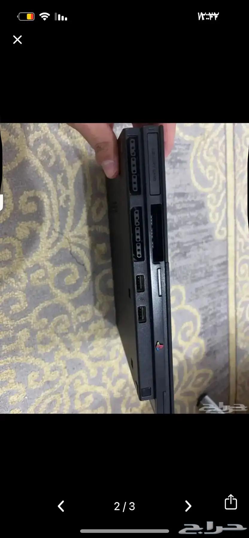 Sony 2 with its controller and cables64423462603267111