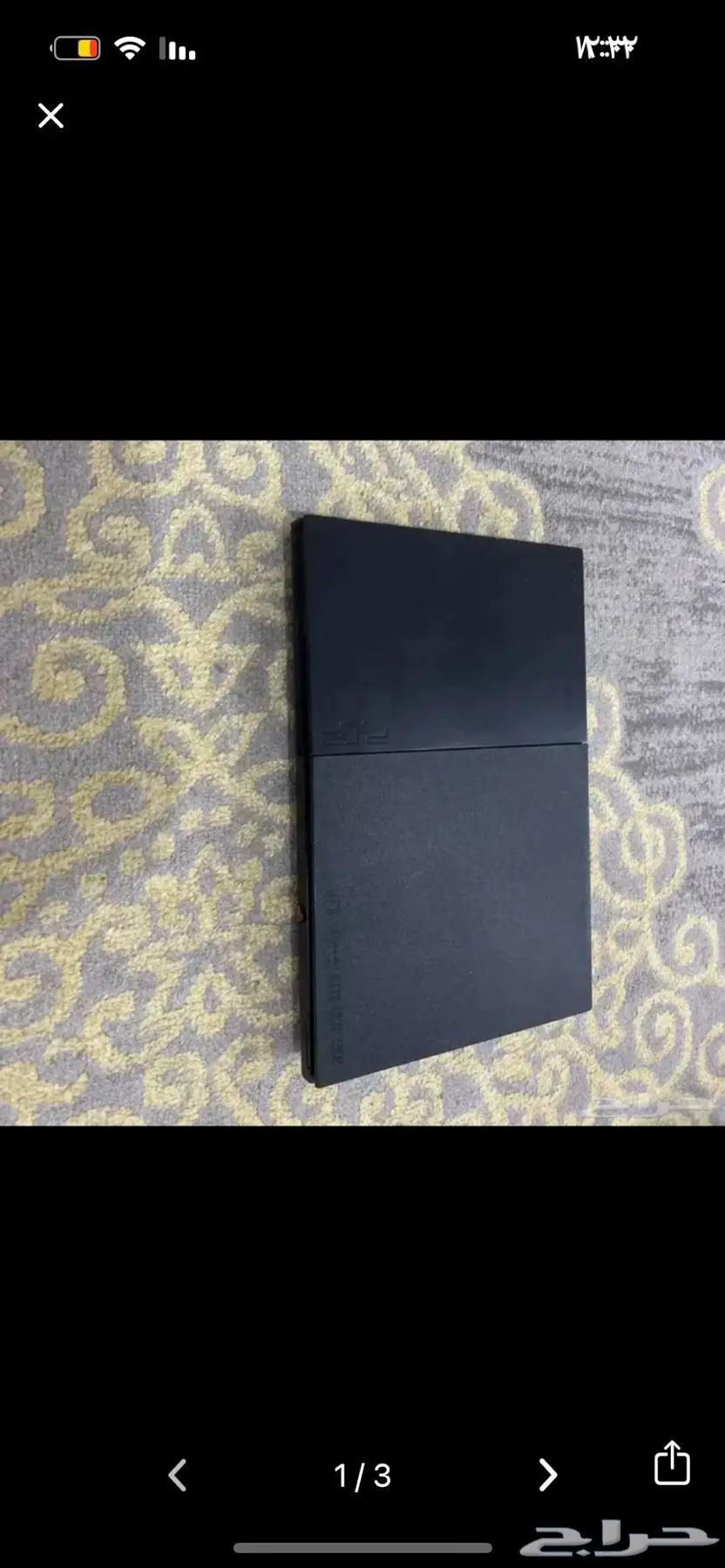 Sony 2 with its controller and cables64423462603267110