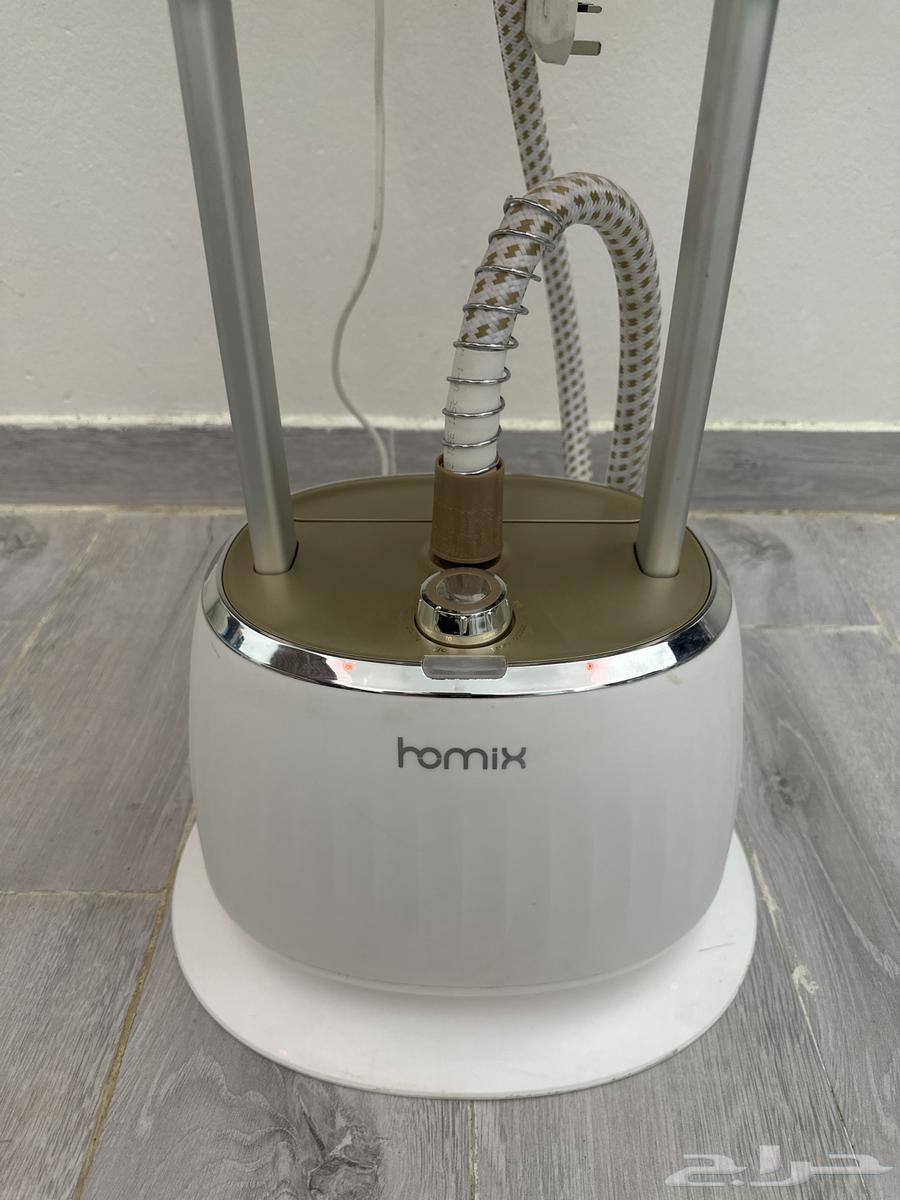 مكواة بخار للملابس .64426995608066111