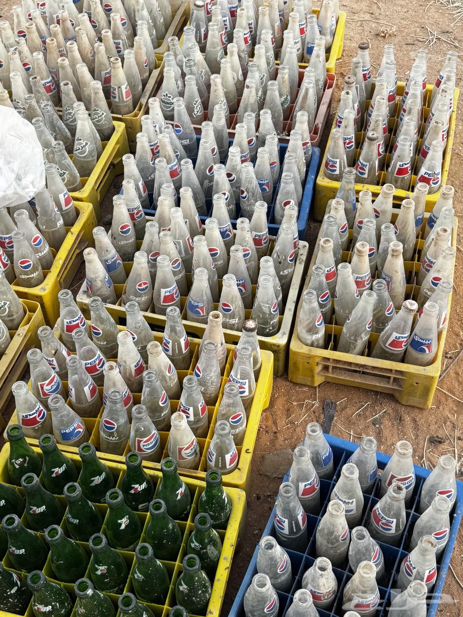 Vintage glass Pepsi, Mirinda, and 7up bottles64430738350211110