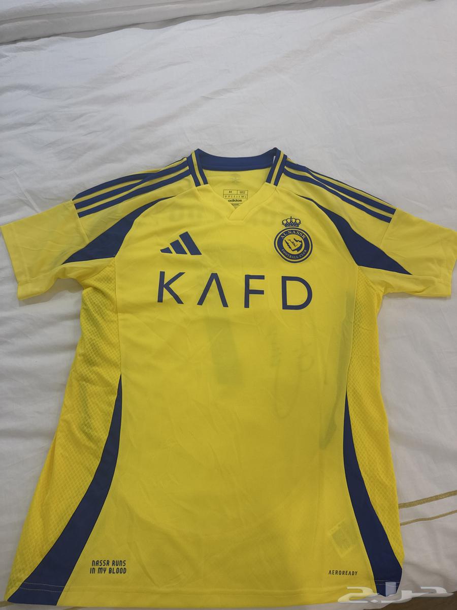 تيشيرت النصر أصلي بتوقيع كرستيانو.64428255346177110