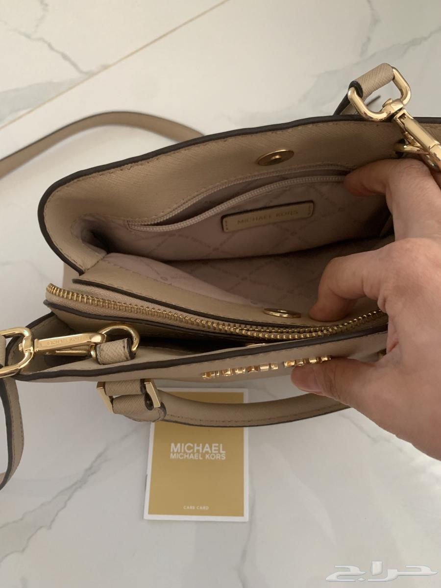 شنطة مايكل كورس لون بيج اصليه   100من امريكا مايكل كورس64430368300418113