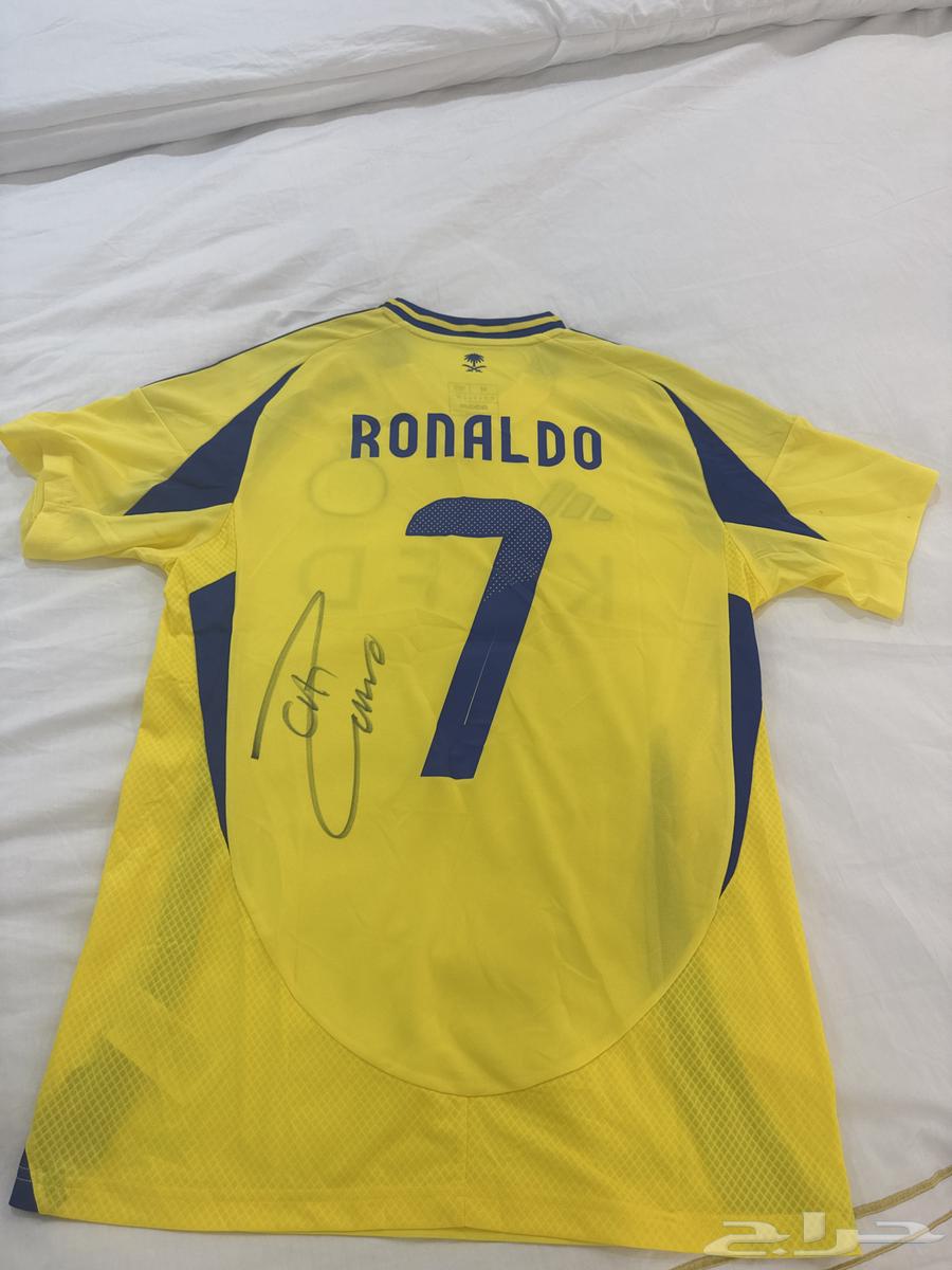 تيشيرت النصر أصلي بتوقيع كرستيانو.64428255346177111