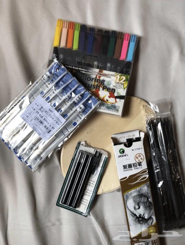 Various charcoal drawing tools, eraser, burned wood pens, wooden board64430516567810110