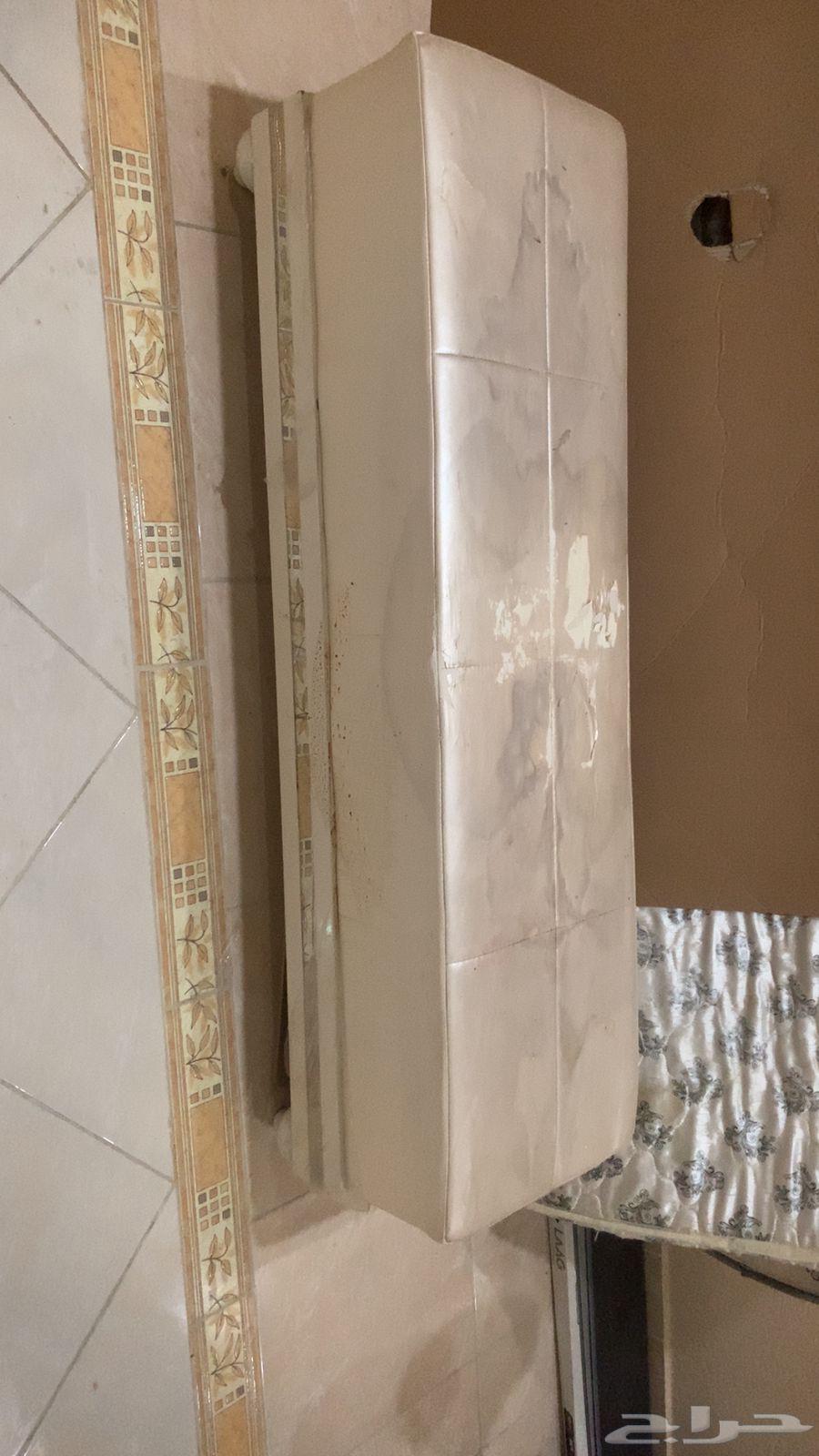 Sofa, mattress, and table64432972003971112