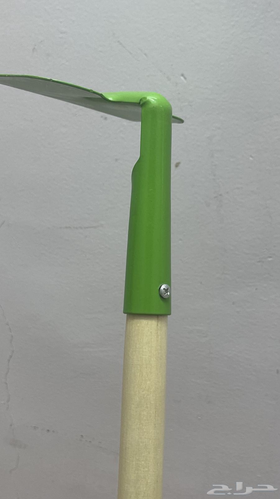 Agricultural tools for sale: rake, comb, and hoe.64441911022850114