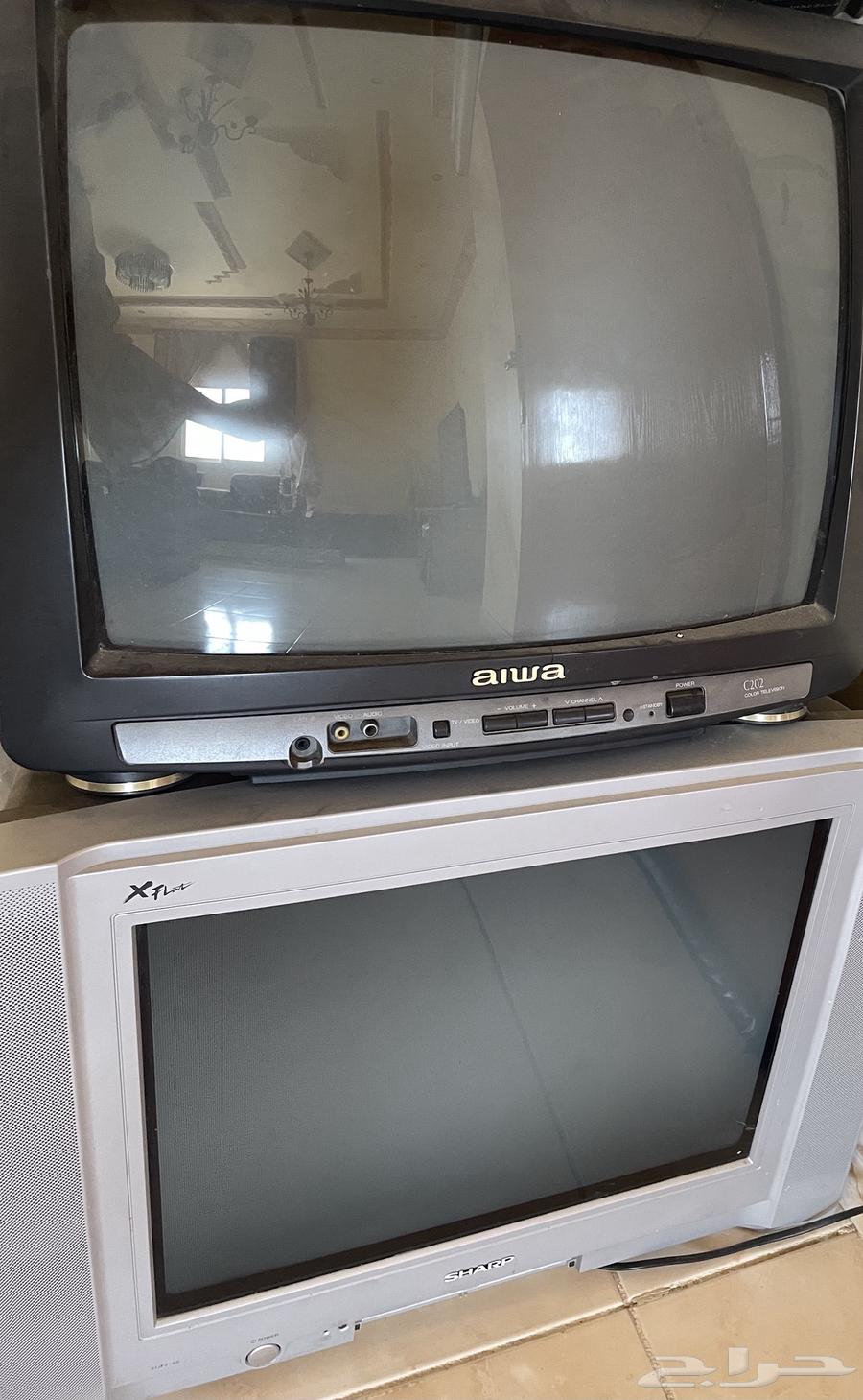 Three old Sharp and Iwa brand televisions with remote64433899694979110