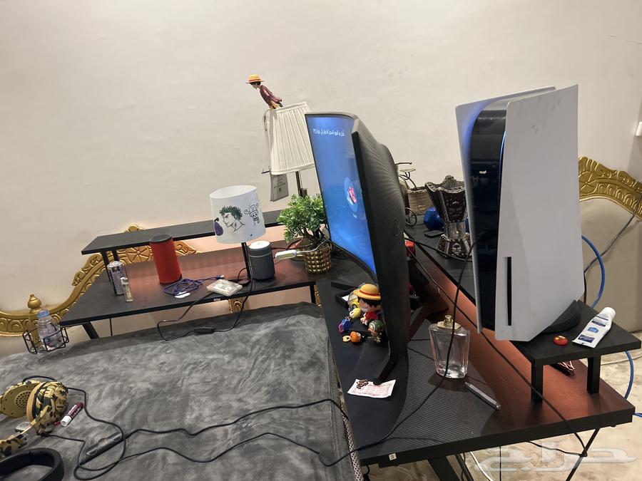 Sony with curved screen and gaming table64439444692483112