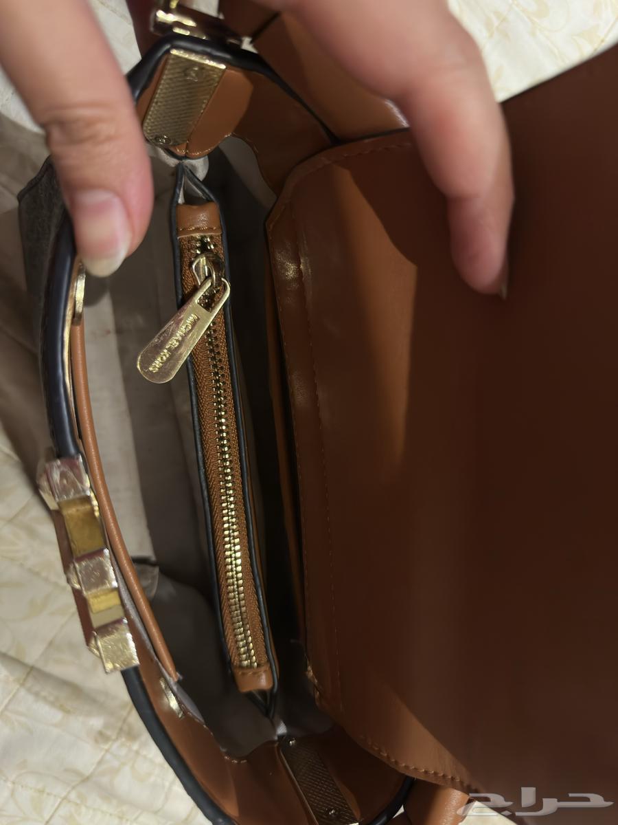 مايكل كورس هاي كوالتي 200 ريال64443735899137111