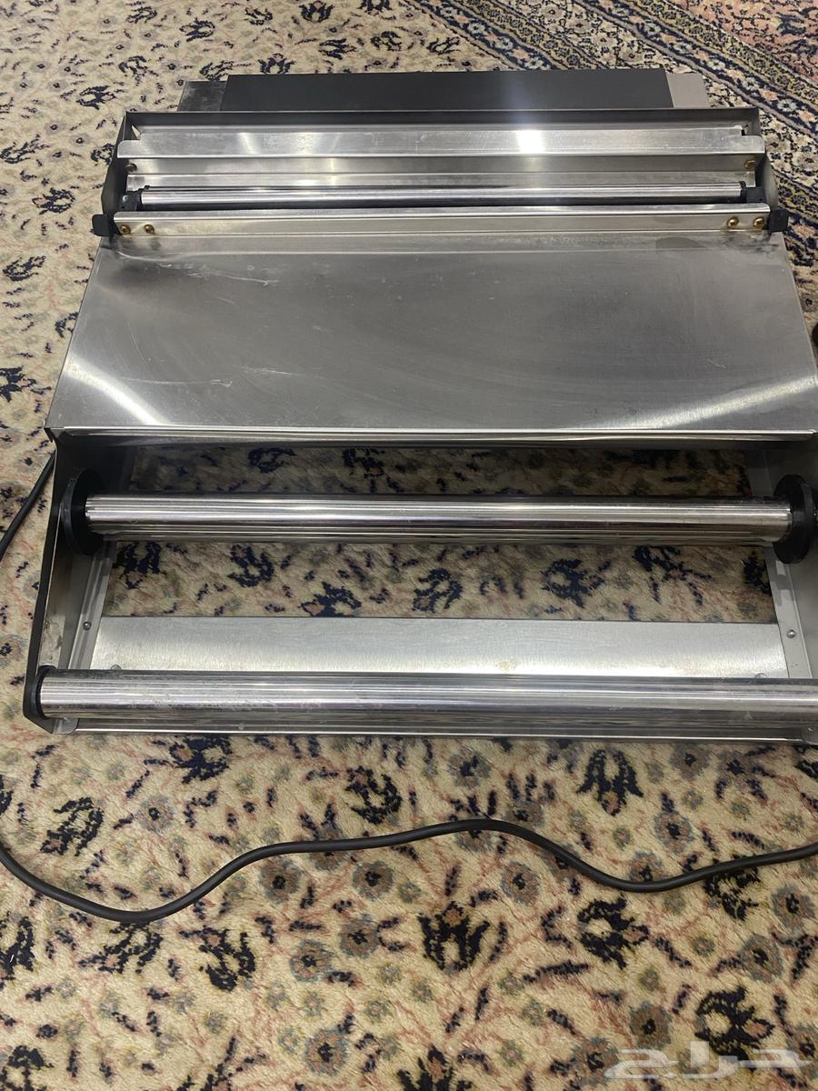 جهاز تغليف اطباق حراري64449328071938114