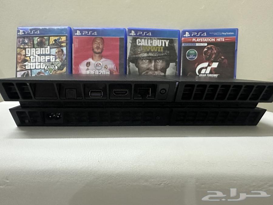 PlayStation 4 with four games and controller with Fortnite account64443317370627112