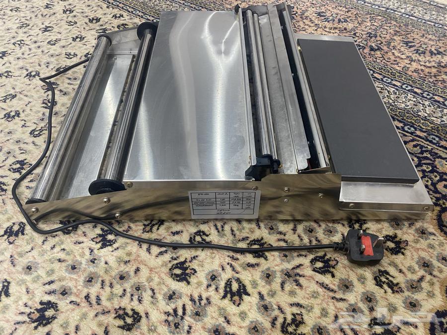 جهاز تغليف اطباق حراري64449328071938113